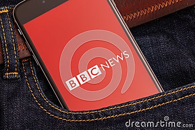 Black phone with red logo of news media BBC News on the screen Editorial Stock Photo