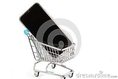 Black phone screen in the shopping cart on the white isolate Stock Photo