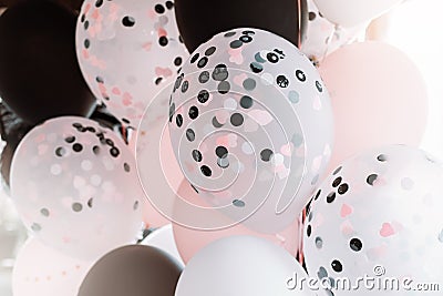 Black and pink balloons background, punchy pink pastel colored and soft focus Stock Photo
