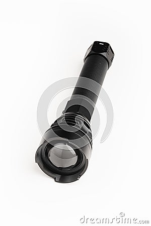 Black pocket flashlight with zoom focus lens, white background Stock Photo