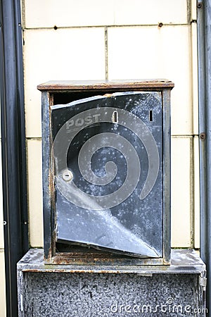 Black postbox in a white wall Stock Photo