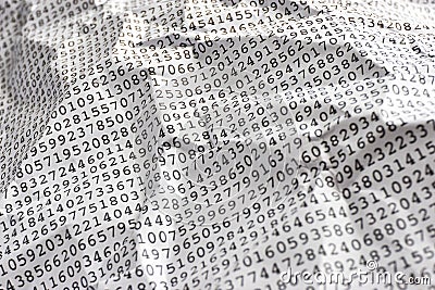 Black printed random monospace numbers on white crumpled pape Stock Photo