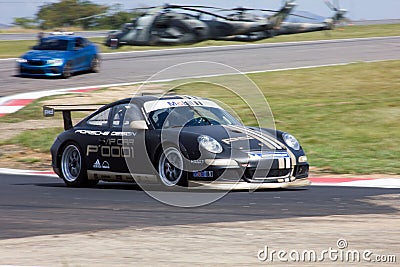 Black racing Porsche gt3 car in competition at San Carlos Circuit, Venezuela Editorial Stock Photo