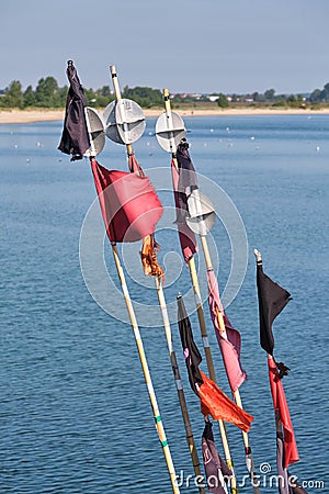 Black and red flags of fishing nets Stock Photo
