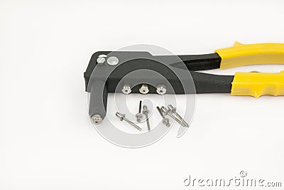 Black rivet pliers and rivet Stock Photo