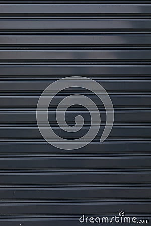 Black roller shutter door closed security background Stock Photo