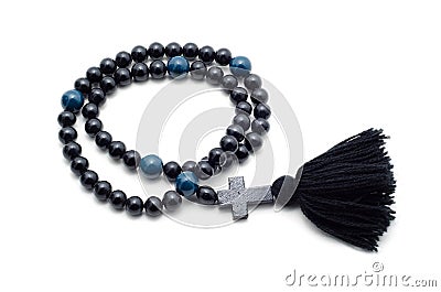 Black rosary isolated on a white background. Stock Photo