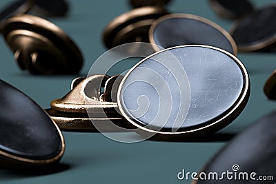 Black Scratched Blank Pin Buttons With Empty Space On Matte Green Background, 3d rendering. Stock Photo