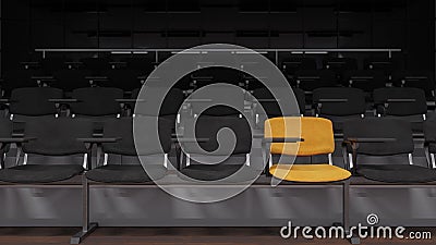 Black Seats with a Single Yellow One Inside a Lecture Room in Dim Light Stock Photo