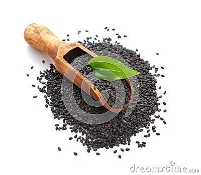 Black sesame seeds. Isolated on white background. Stock Photo