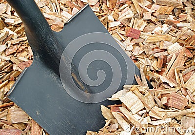 Black shovel and mulch Stock Photo