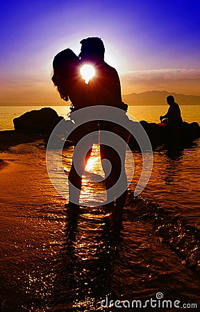 Black silhouettes of a lovers couple Stock Photo