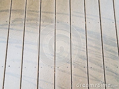Black skid marks or lines on wood deck Stock Photo