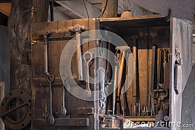 Black smith tools spotlighted for used in a demostration Stock Photo