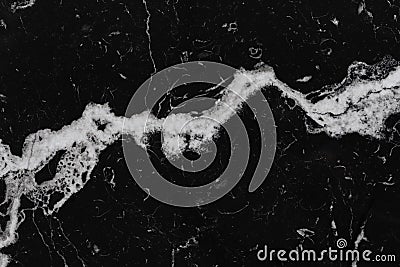 Black smooth marble texture with white streaks Stock Photo