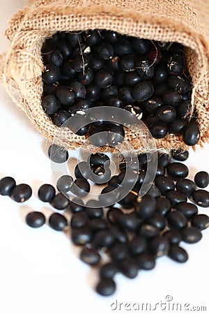 Black soya bean in burlap sack Stock Photo