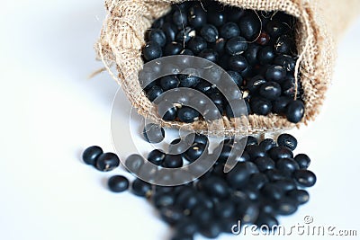 Black soya bean in burlap sack Stock Photo