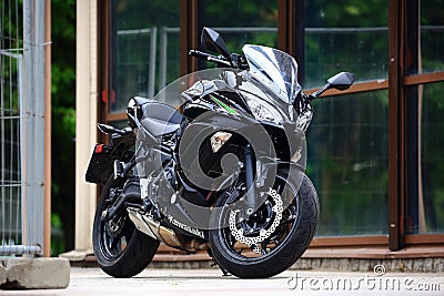 Black sport bike Kawasaki Ninja in the rain Editorial Stock Photo