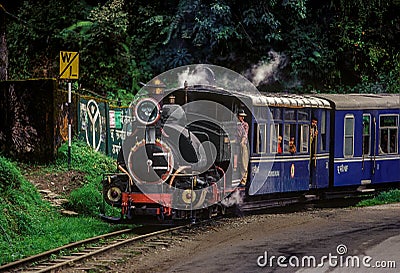 The black steam powered Darjeeling Toy Train Editorial Stock Photo