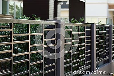 Black steel fence of residential house modern Stock Photo