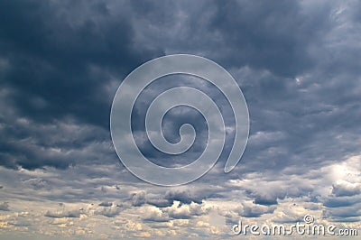 Black storm clouds and bright horizon Stock Photo