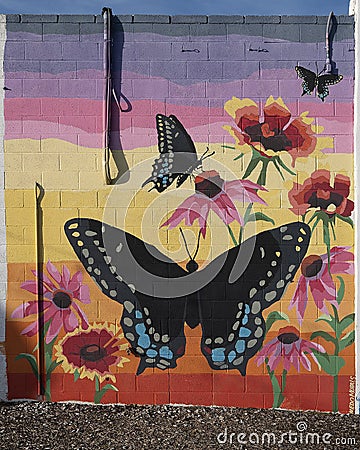 Black swallowtail butterfly mural in East Downtown Norman, Oklahoma. Editorial Stock Photo