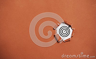 Black target dartboard inside of red drill paper hole with copy space for setup business objective target and goal concept Stock Photo
