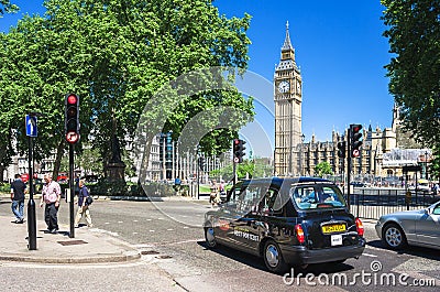 Black taxi cab in front of Big Ben. London, UK Editorial Stock Photo