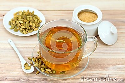 Black tea with flavor of green cardamom seeds Stock Photo