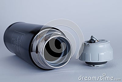 Black thermos cup on white background Stock Photo