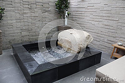 Black tiled spa Stock Photo