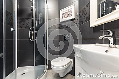 Black tiles in contemporary toilet Stock Photo