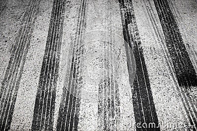 Black tire tracks on road Stock Photo
