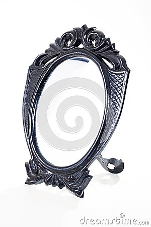 Black toy mirror On isolated white studio background. Clipping path. Single object on white background. Stock Photo