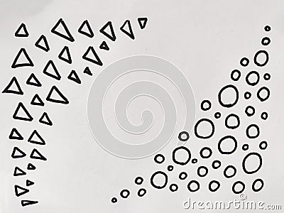Black triangles and circles are arranged in two distinct patterns, showcasing geometric design on a stark white surface Stock Photo