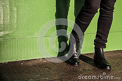 Black trousers and ladies vintage boots Stock Photo