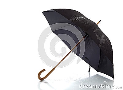 Black umbrella on a white background Stock Photo