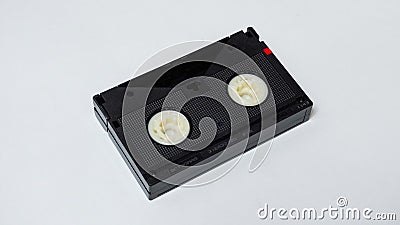 Black videotape in betacam sp format on a white background, back side Stock Photo