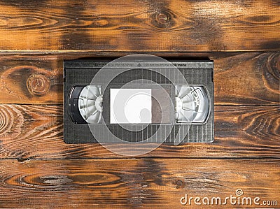 black videotape on a wooden background. copy space. Stock Photo