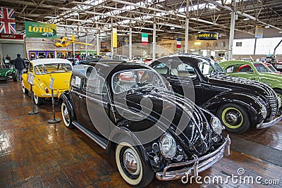 A black 1956 Volkswagen Beetle at Lane Motor Museum with the largest collection of vintage European cars, motorcycles and bicycles Editorial Stock Photo