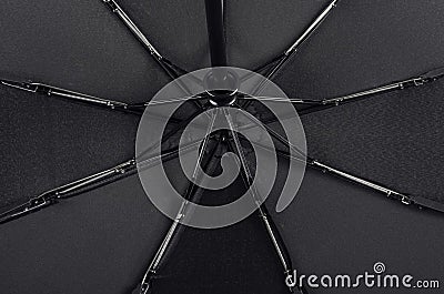 Black waterproof umbrella texture with water droplets Stock Photo