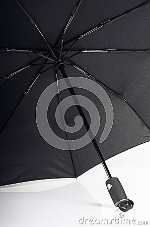 Black waterproof umbrella texture with water droplets Stock Photo