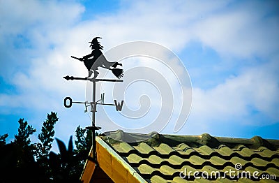 Black weathervane in the form of a witch Stock Photo