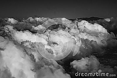 Black and white Aerial view of clouds outside my airplane window Stock Photo