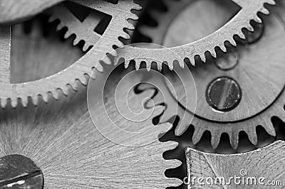 Black white background with metal cogwheels a clockwork. Macro Stock Photo