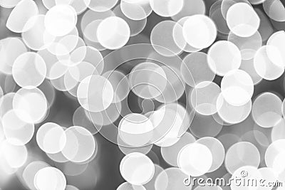 Black white bokeh background. Defocused bokeh. Monochrome abstract texture. Christmas soft light Bokeh abstract background. Stock Photo