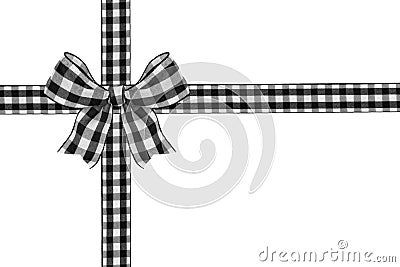 Black and white buffalo plaid Christmas gift bow and ribbon arranged as wrapped gift box isolated on white Stock Photo