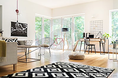 Multifunctional living room with workspace Stock Photo