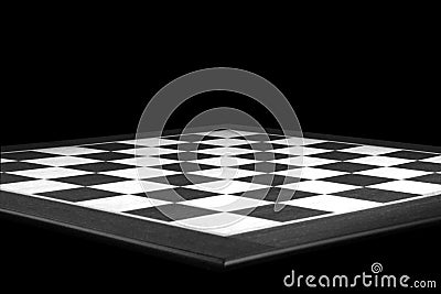 Black and white chessboard close-up, black backdrop Stock Photo