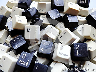 Black and white computer keyboard keys, mostly numeric with ML Machine learning buttons at the front. Concept of unstructured Stock Photo